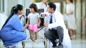 Nurse interacting with child