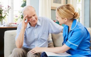 Nurse visits senior man home who is suffering with depression